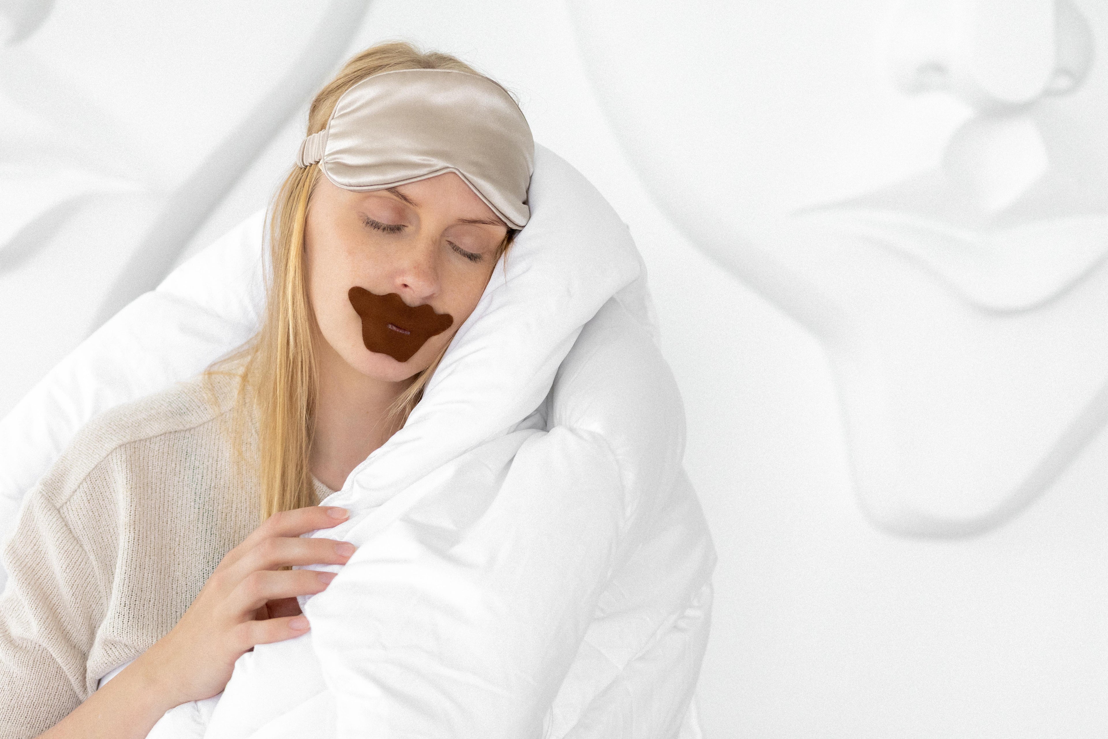 women is sleeping and Mouth tape on lips  